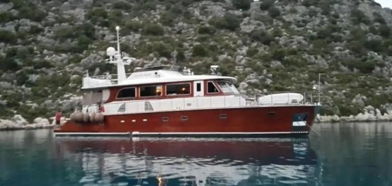 a red and white boat in the water aboard GRAND AZURE  Yacht for Sale