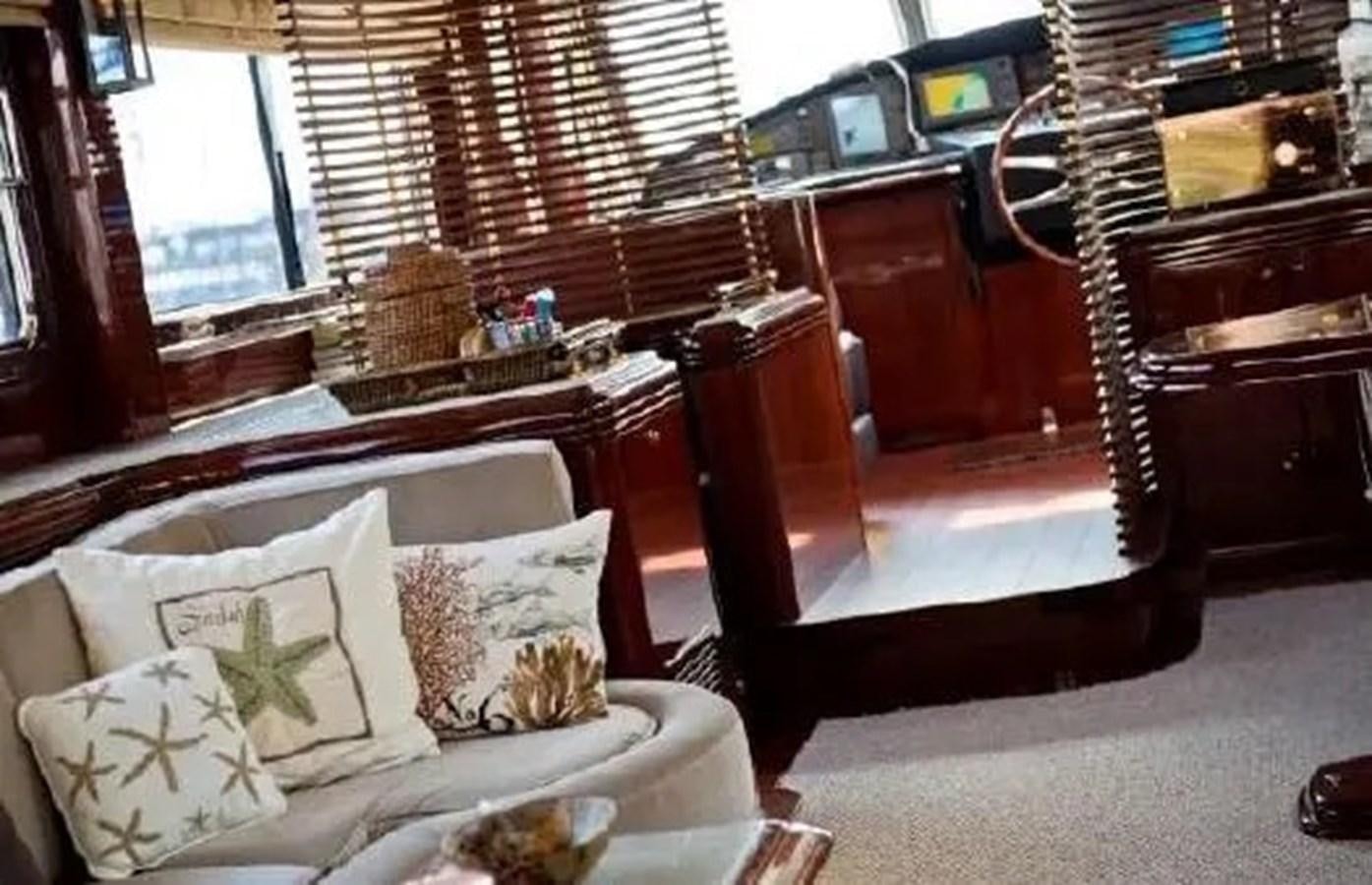 a room with a couch and a piano aboard GRAND AZURE  Yacht for Sale