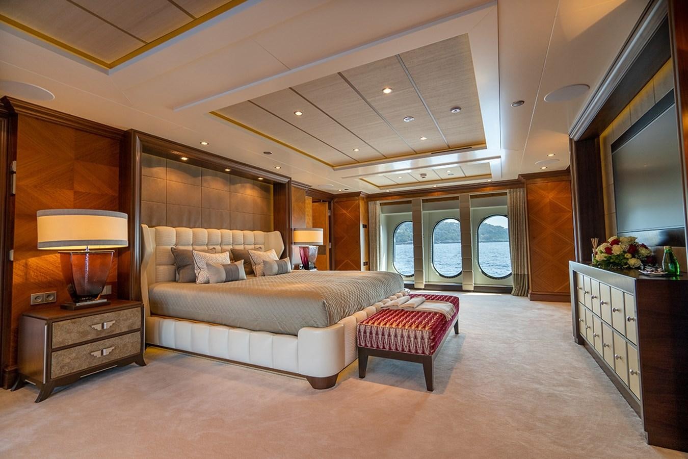 a large living room with a large bed aboard KAISER Yacht for Sale