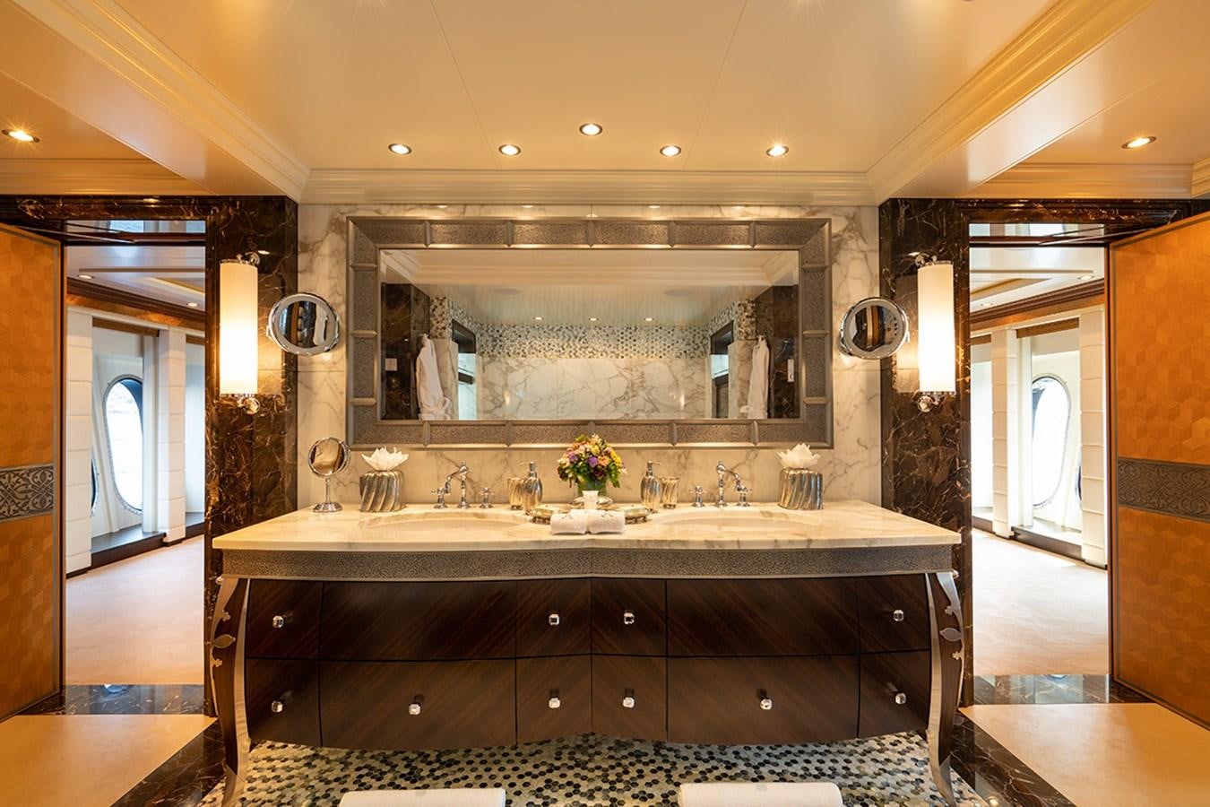 a bathroom with a large marble countertop aboard KAISER Yacht for Sale