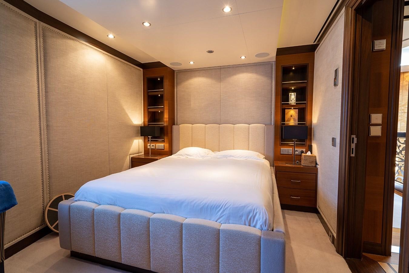 a bedroom with a bed and a closet aboard KAISER Yacht for Sale