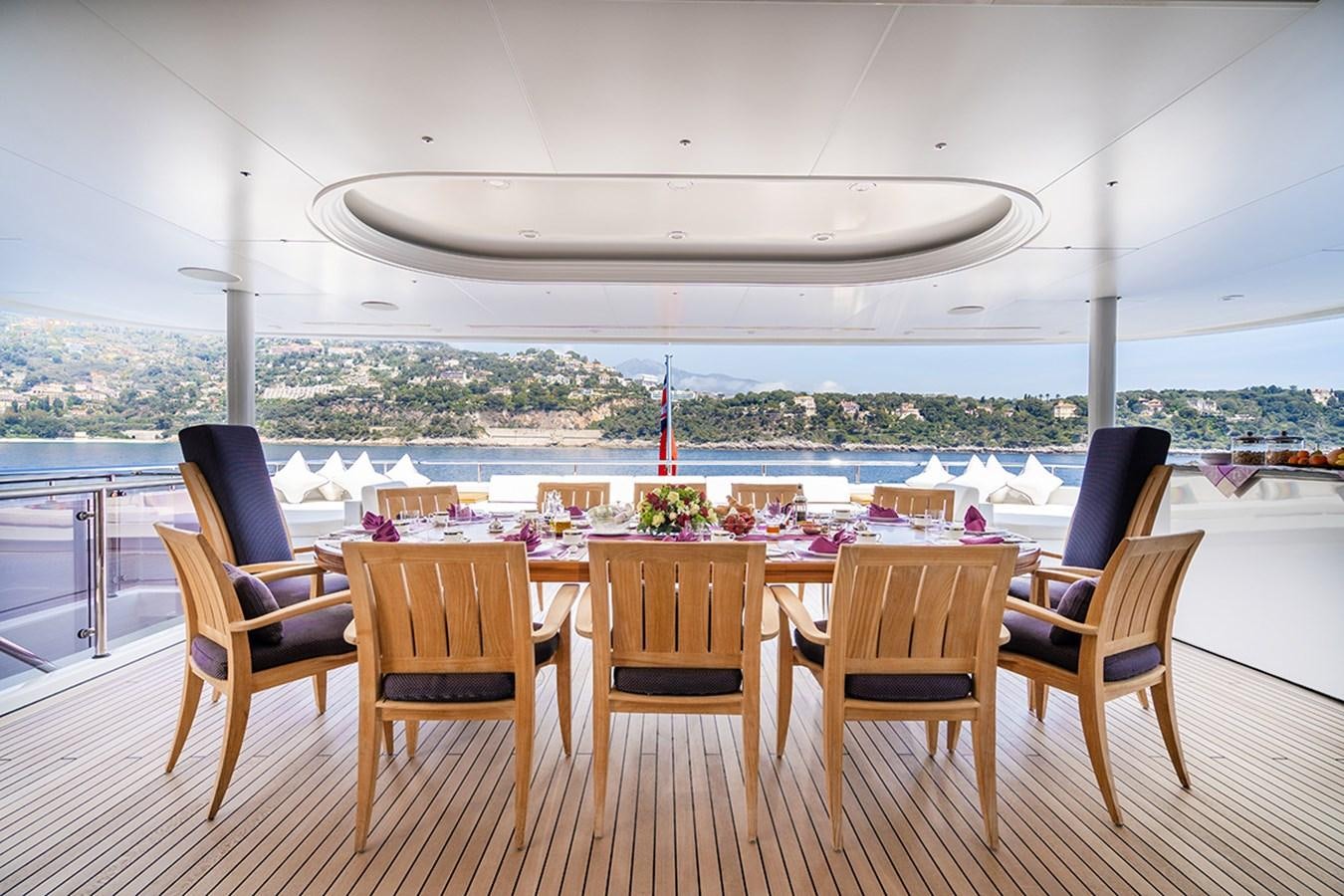 a table set for a meal aboard KAISER Yacht for Sale