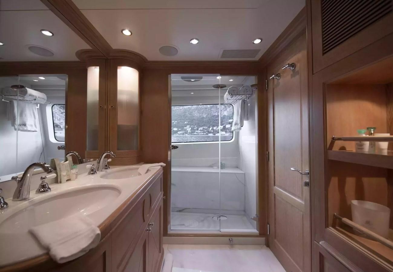 a bathroom with a large window aboard SOHO Yacht for Charter