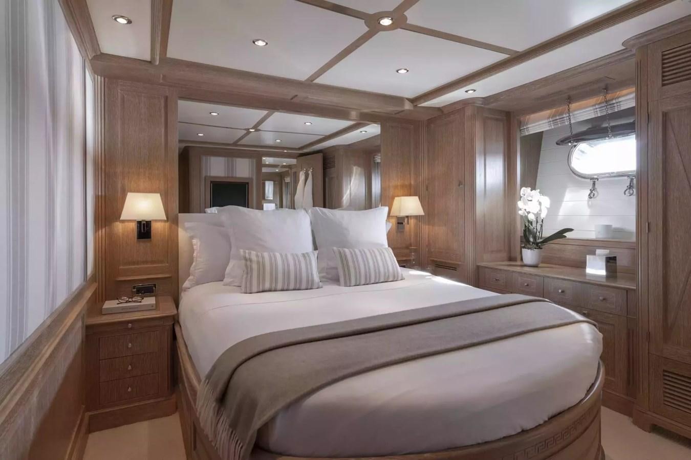 a bed in a room aboard SOHO Yacht for Charter