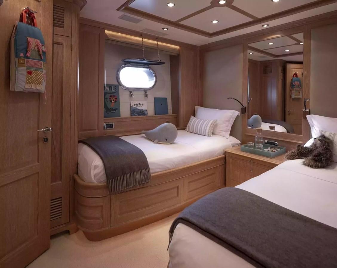 a room with two beds aboard SOHO Yacht for Charter