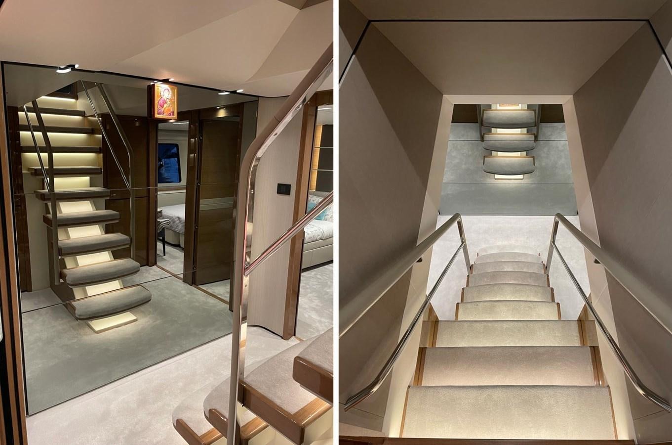 a long hallway with stairs aboard AFON Yacht for Sale