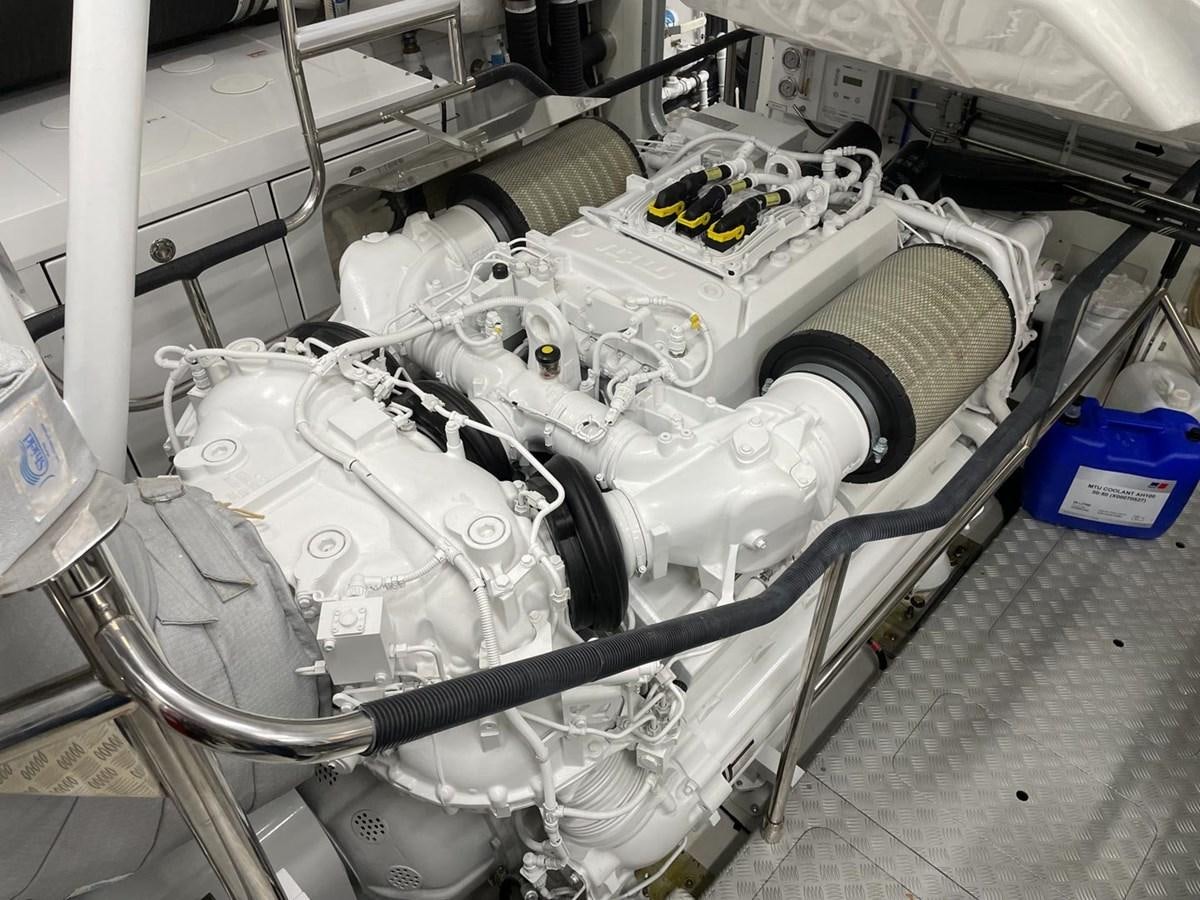 a car engine with a hood aboard AFON Yacht for Sale