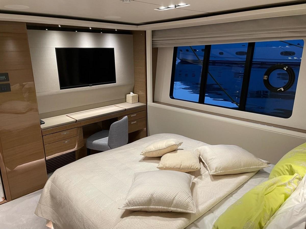 a room with a bed and a tv aboard AFON Yacht for Sale