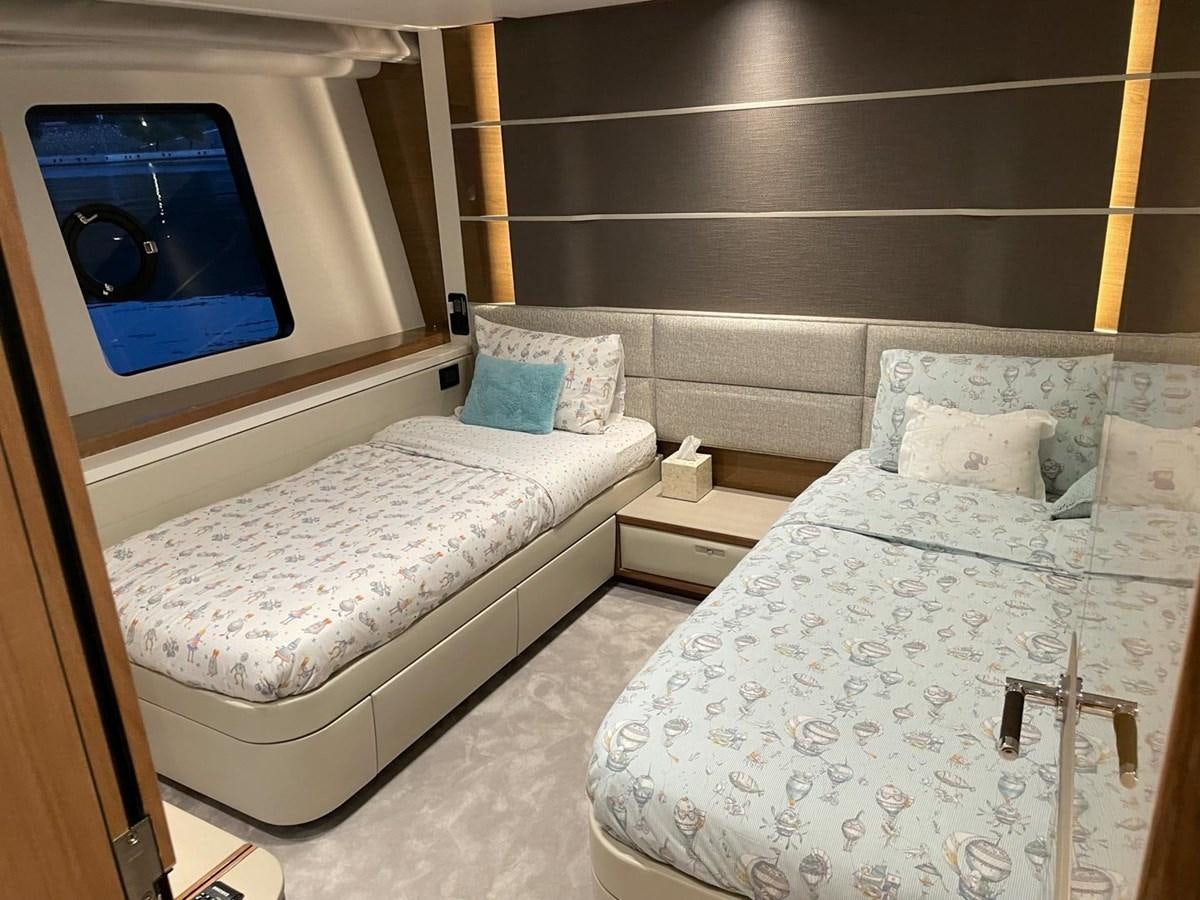 a room with two beds aboard AFON Yacht for Sale