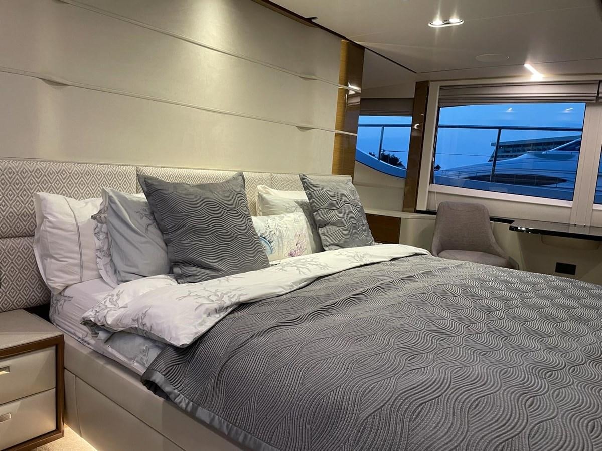 a bed with a large bed aboard AFON Yacht for Sale