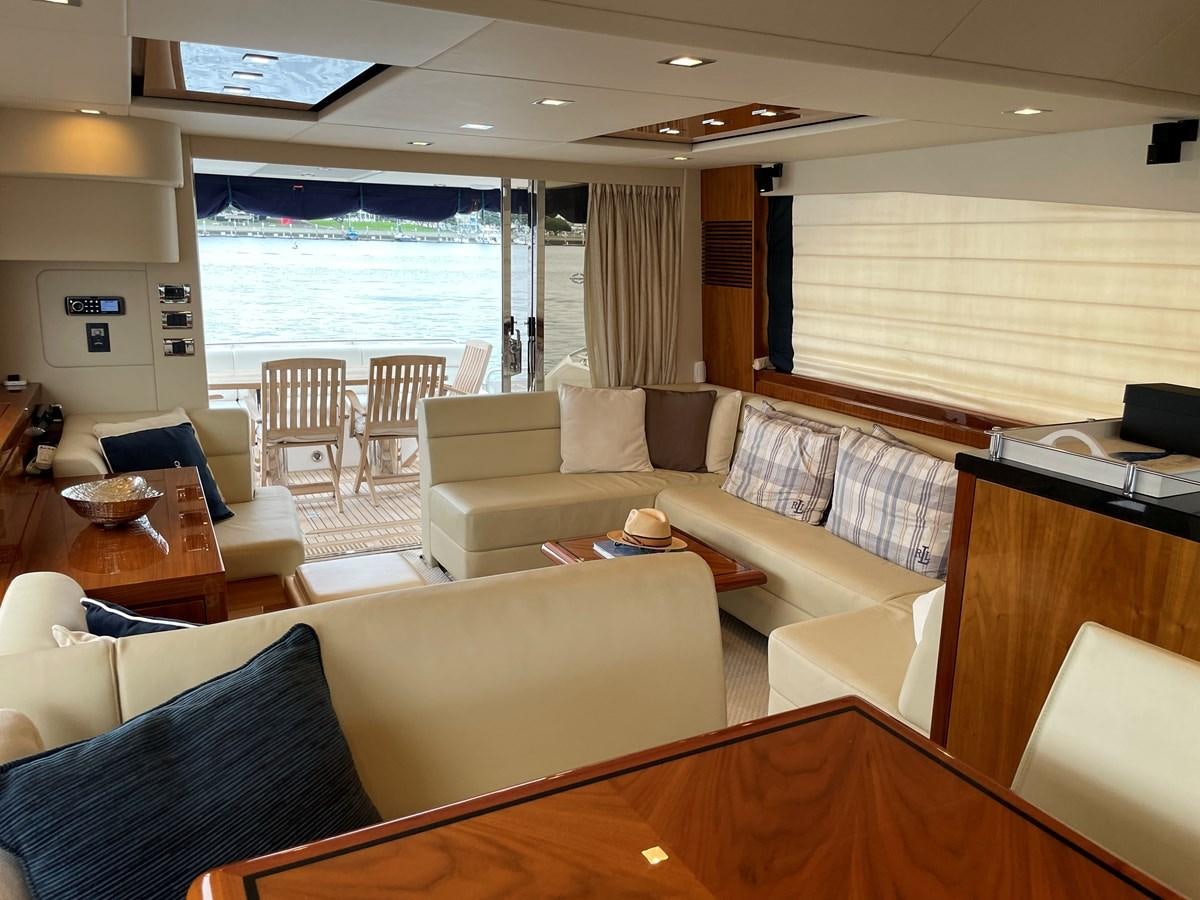 a living room with a couch and a table aboard GRACE ELLEN Yacht for Sale