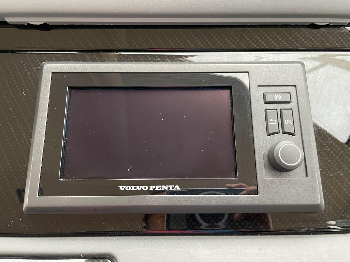 a small television on a table aboard GRACE ELLEN Yacht for Sale