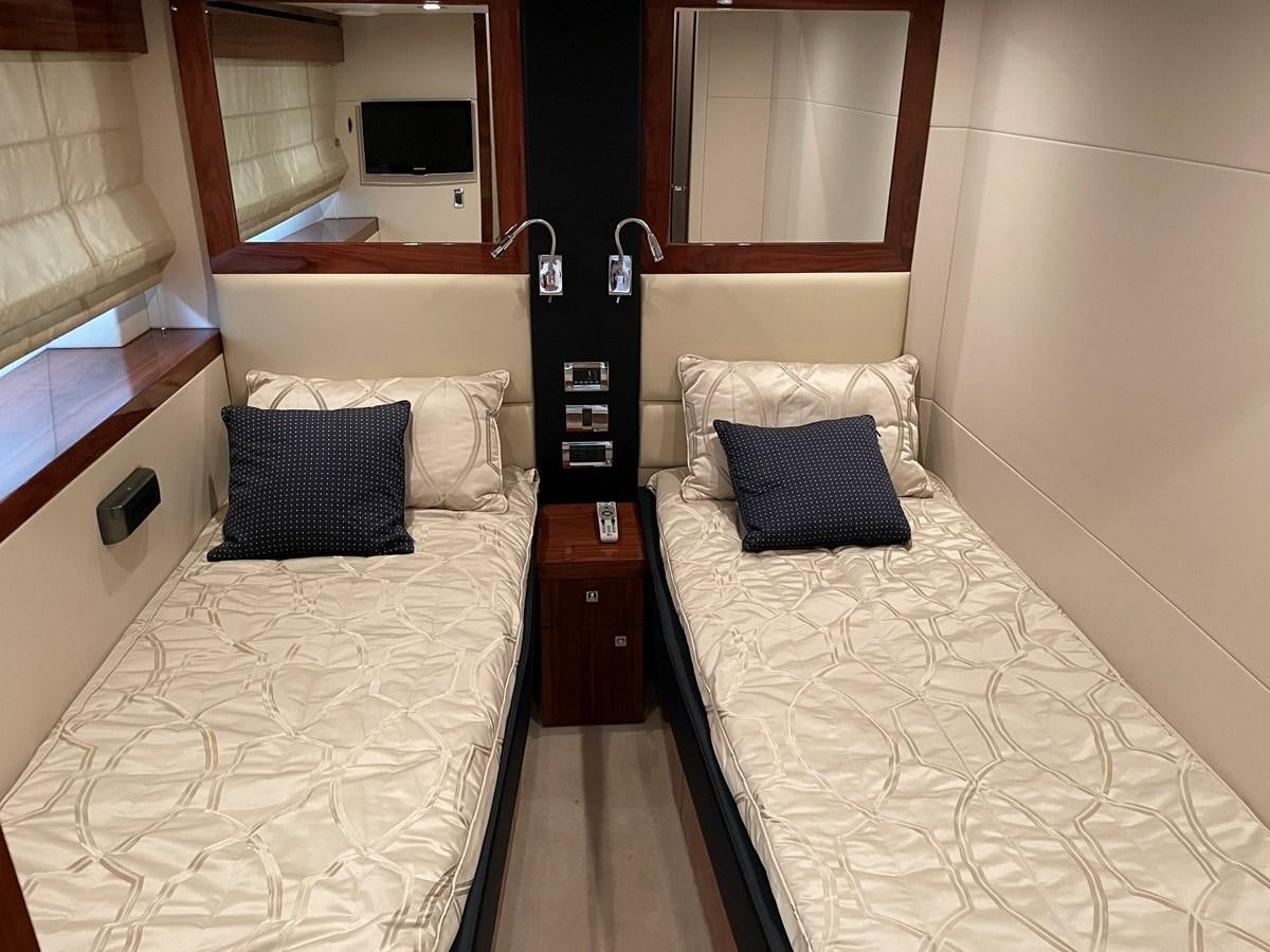 a couple of beds in a hotel room aboard GRACE ELLEN Yacht for Sale