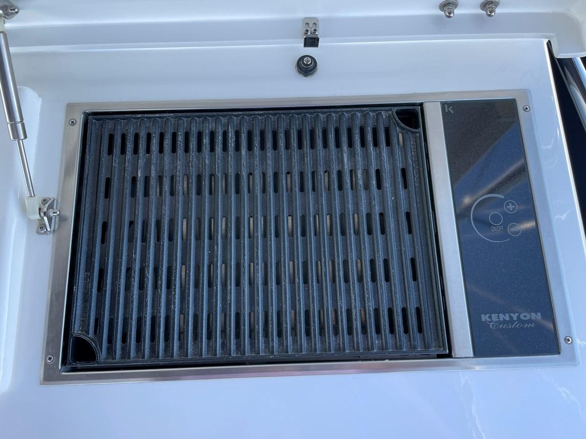 a white computer with a black case aboard GRACE ELLEN Yacht for Sale