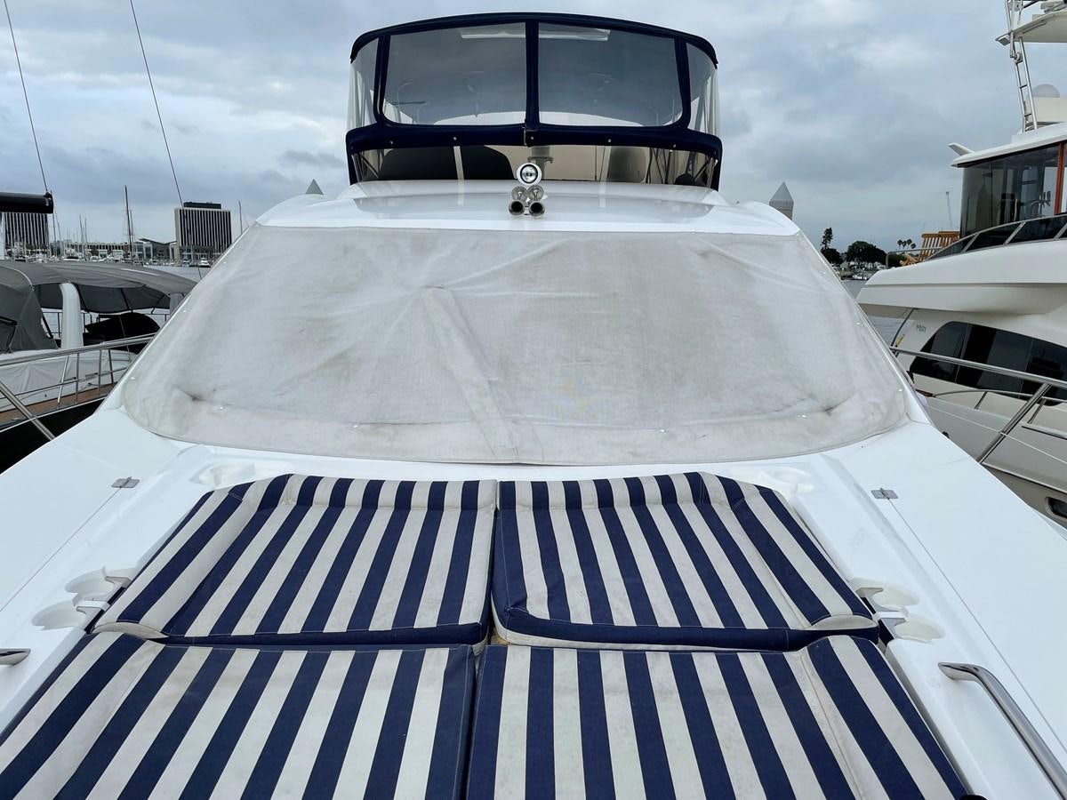 a white and black striped boat aboard GRACE ELLEN Yacht for Sale