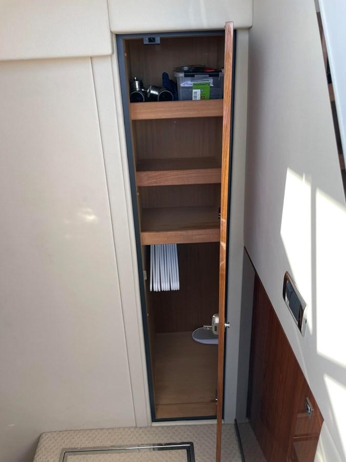 a closet with a door aboard GRACE ELLEN Yacht for Sale