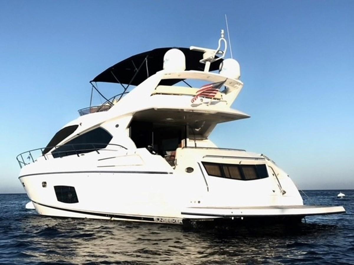 a white yacht on the water aboard MOONLIGHT DRIVE Yacht for Sale