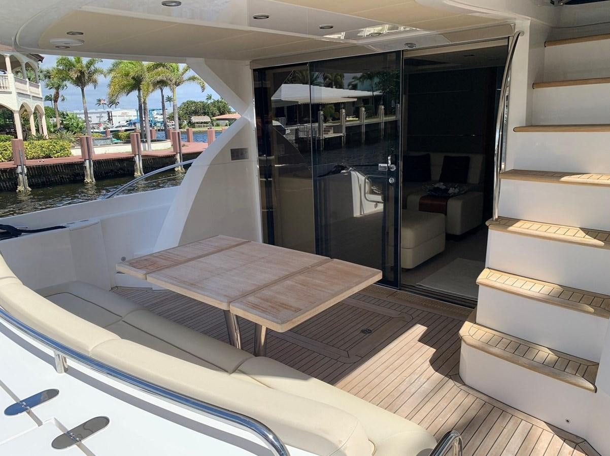 a room with a bed and a table aboard MOONLIGHT DRIVE Yacht for Sale
