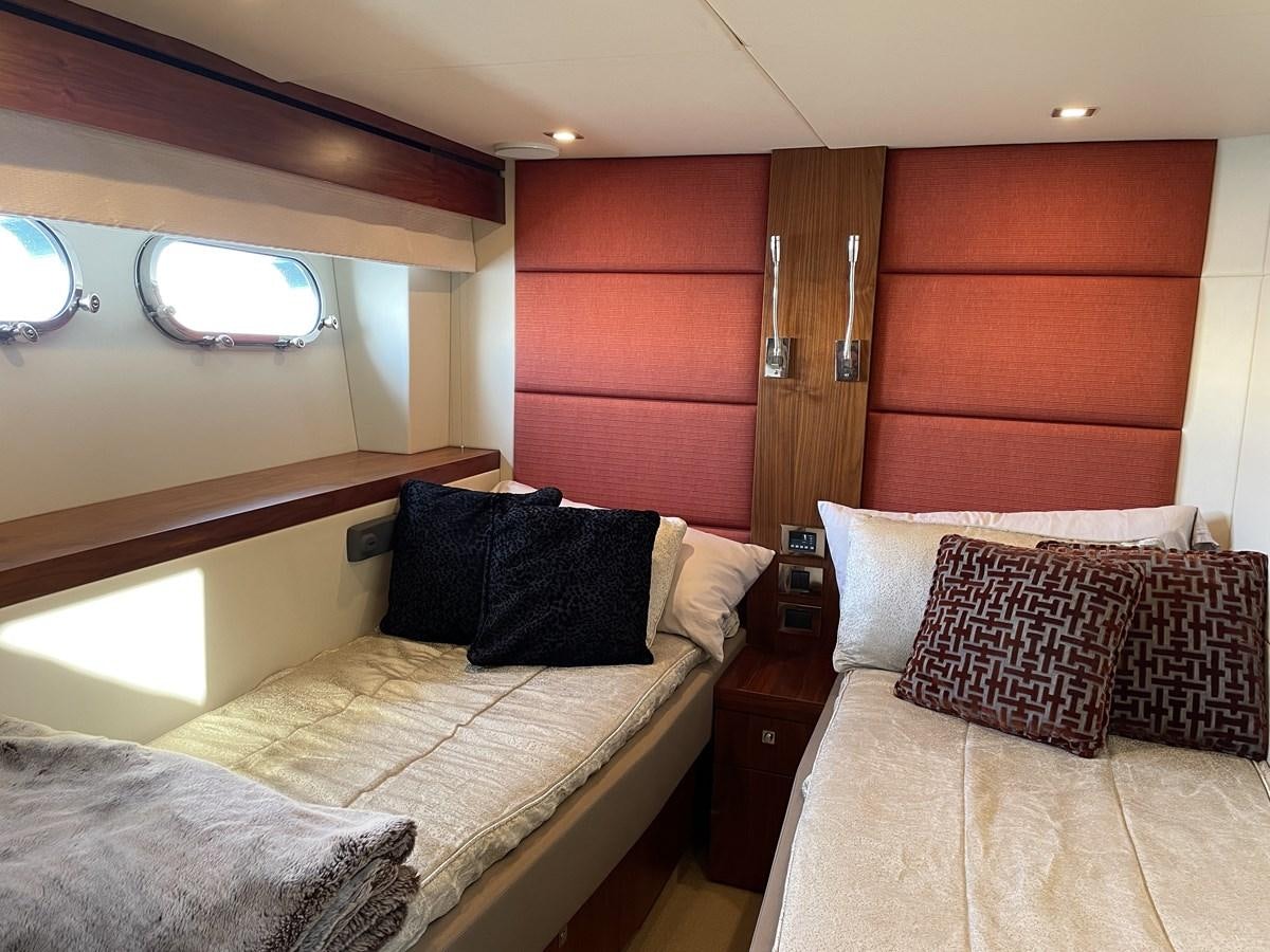 a room with two beds aboard MOONLIGHT DRIVE Yacht for Sale