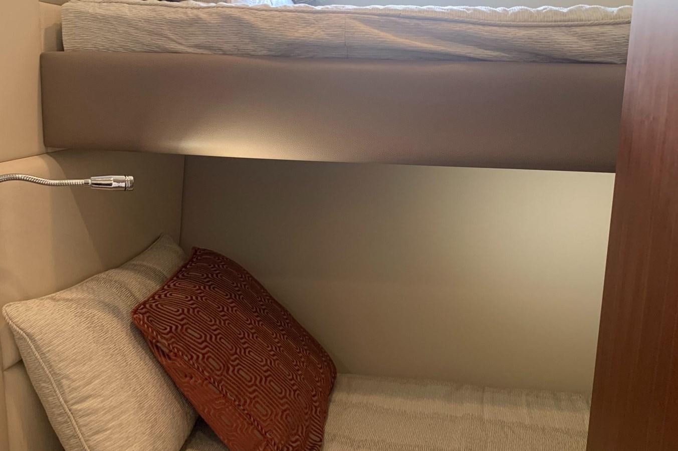 a bed with pillows aboard MOONLIGHT DRIVE Yacht for Sale