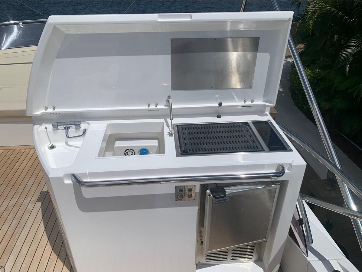 a white stove with a vent aboard MOONLIGHT DRIVE Yacht for Sale