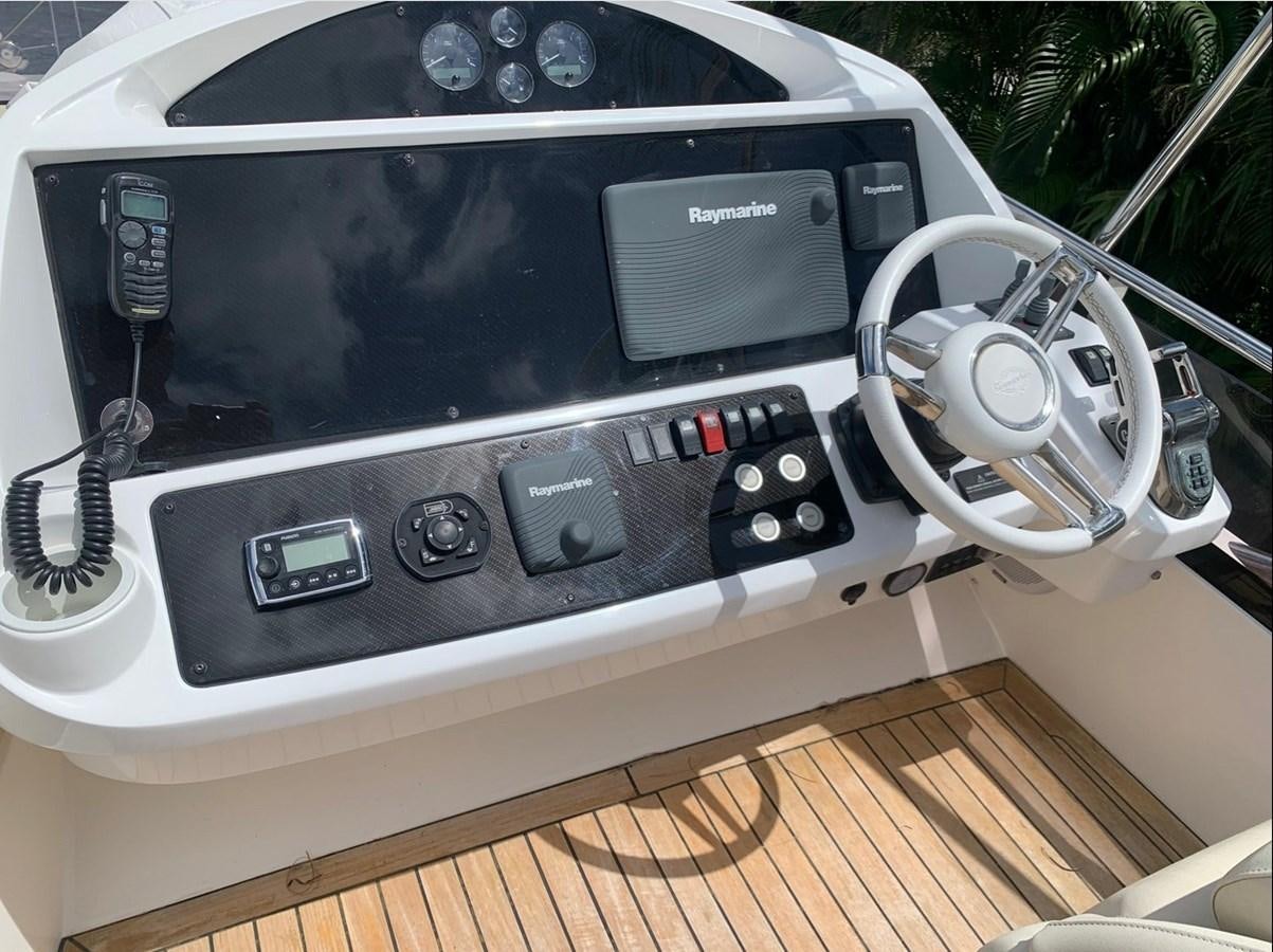 a black electronic device aboard MOONLIGHT DRIVE Yacht for Sale