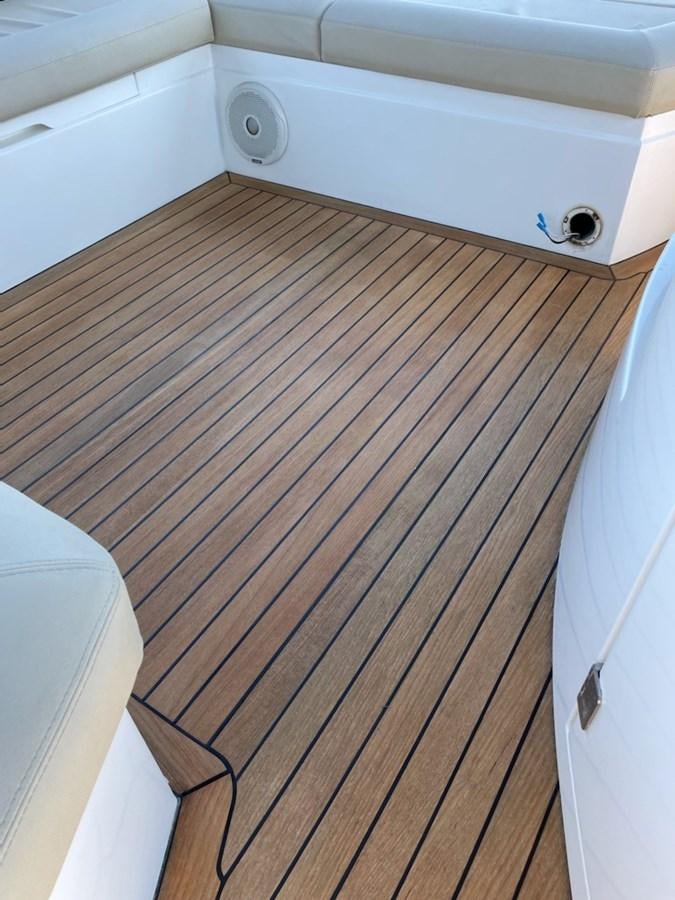 a wooden floor with a white wall aboard MOONLIGHT DRIVE Yacht for Sale