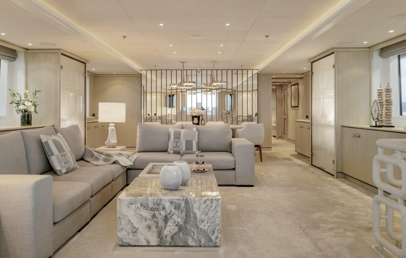 a living room with a large window aboard LUCKY US Yacht for Sale
