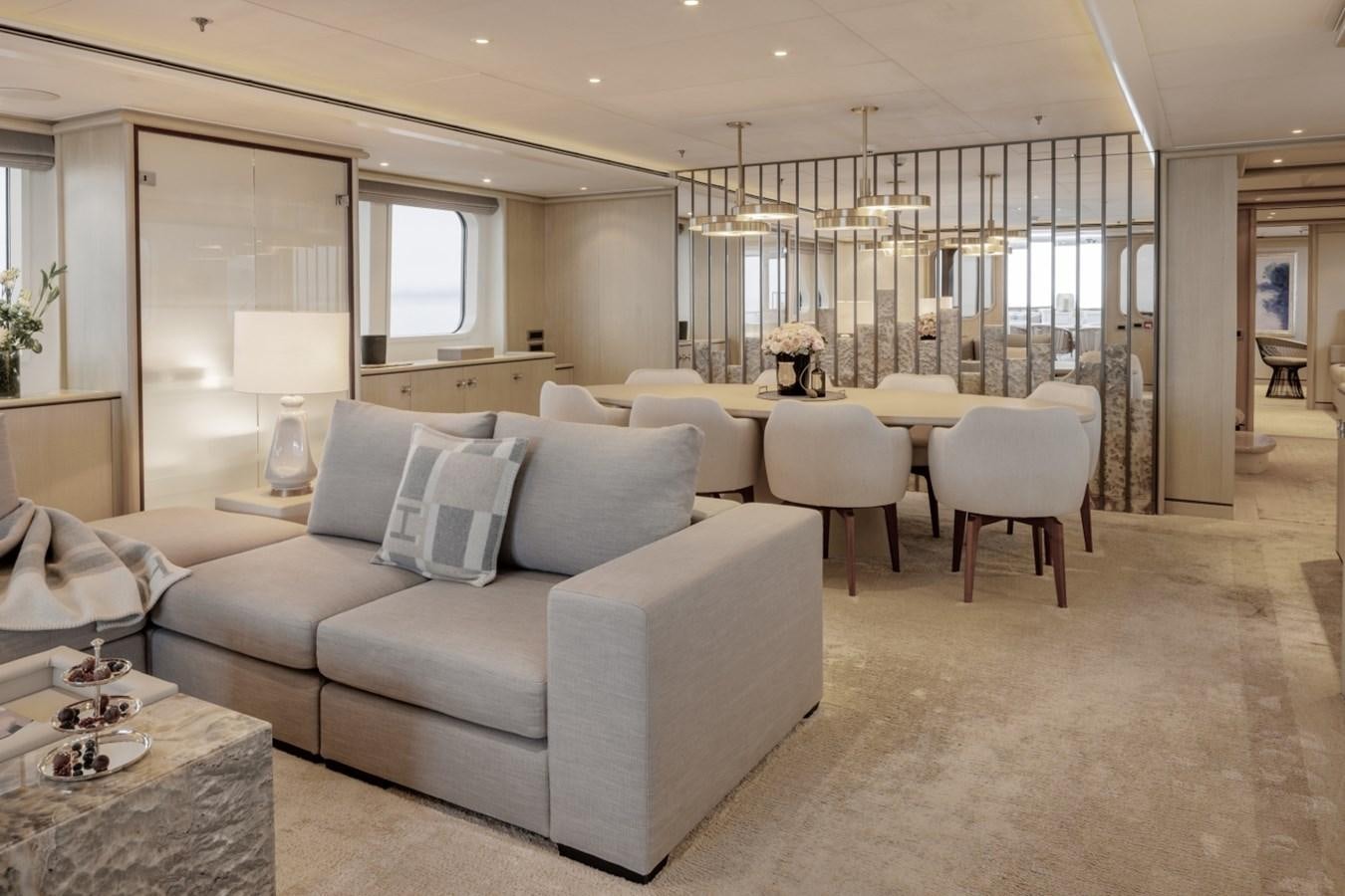 a living room with a large glass window aboard LUCKY US Yacht for Sale