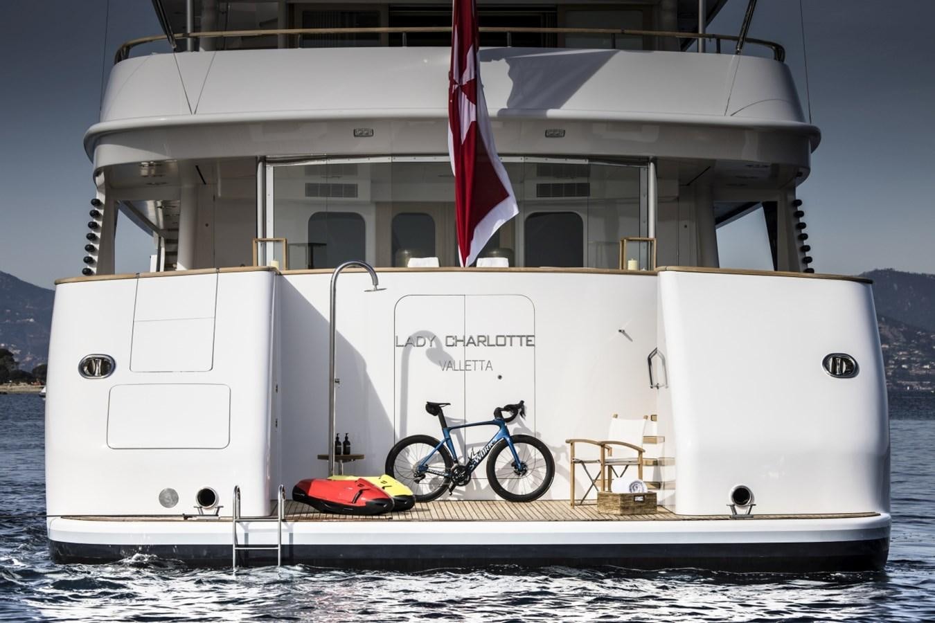 a boat with a bicycle on the front aboard LUCKY US Yacht for Sale