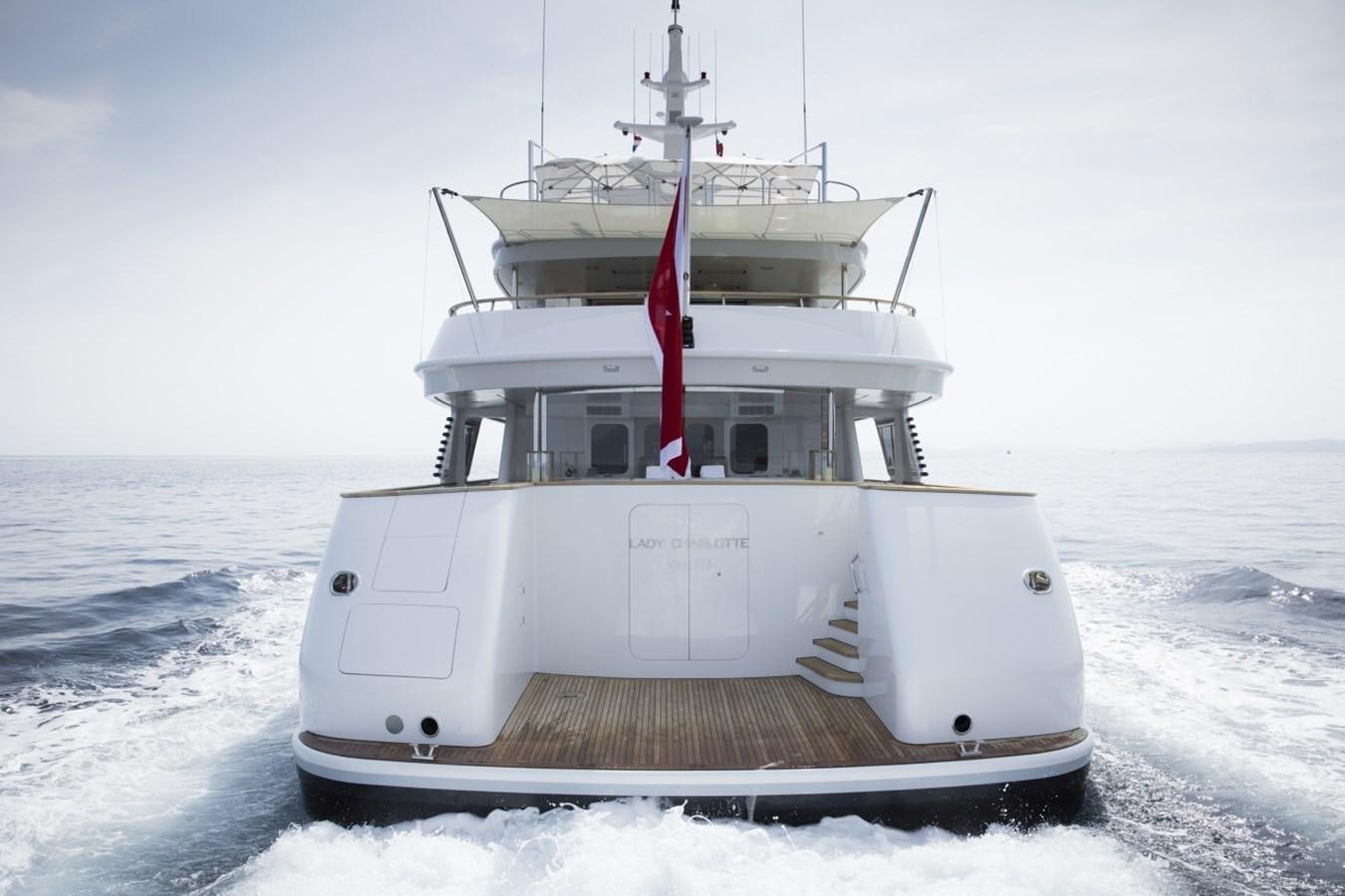 a white boat in the water aboard LUCKY US Yacht for Sale