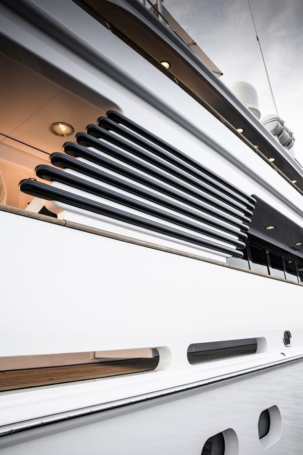 a close-up of a white piano aboard LUCKY US Yacht for Sale