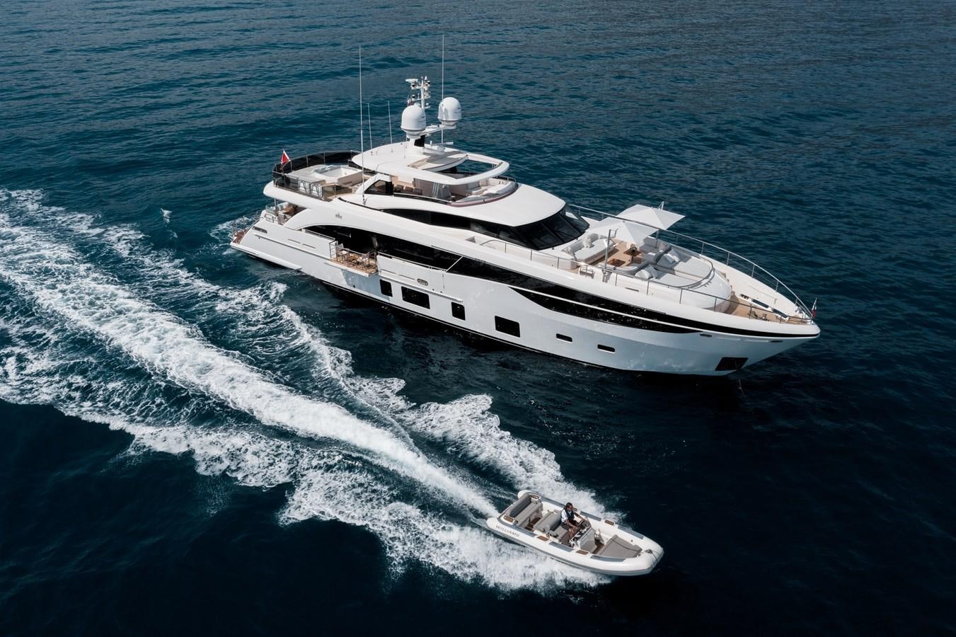 a boat on the water aboard RIVIERA LIVING Yacht for Sale