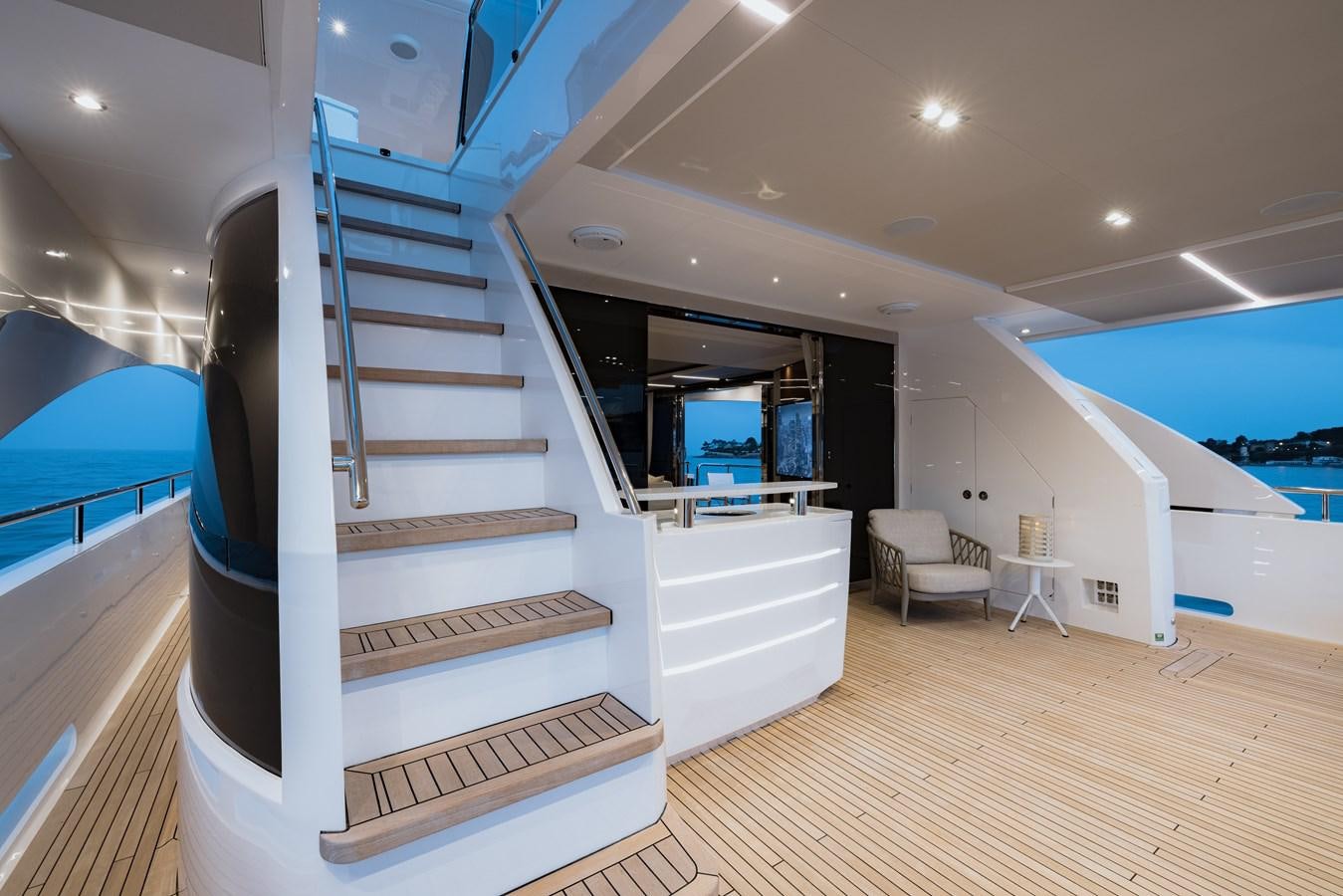 a staircase in a building aboard RIVIERA LIVING Yacht for Sale