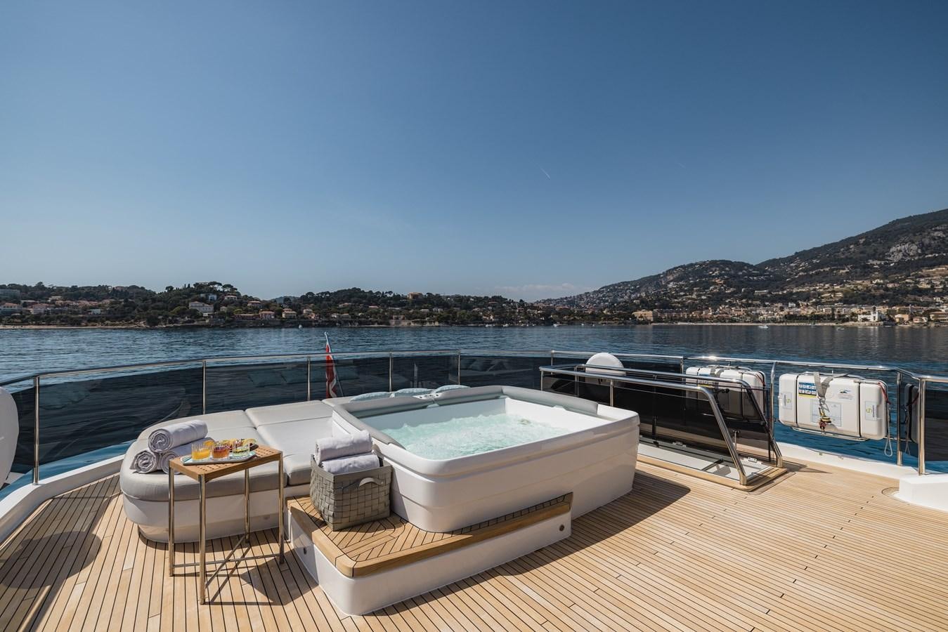a boat on a deck aboard RIVIERA LIVING Yacht for Sale