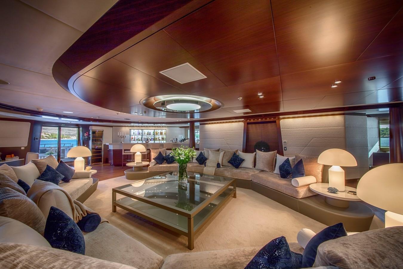 a living room with a large window aboard KATINA Yacht for Charter