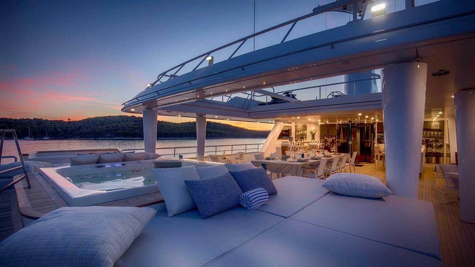 a large patio with a large pool aboard KATINA Yacht for Charter