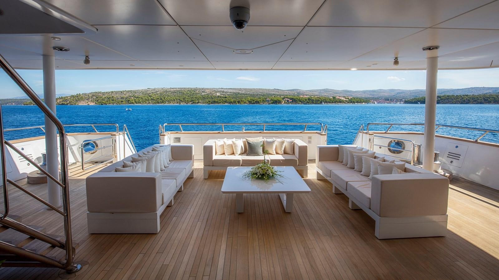 a living room with a pool aboard KATINA Yacht for Charter