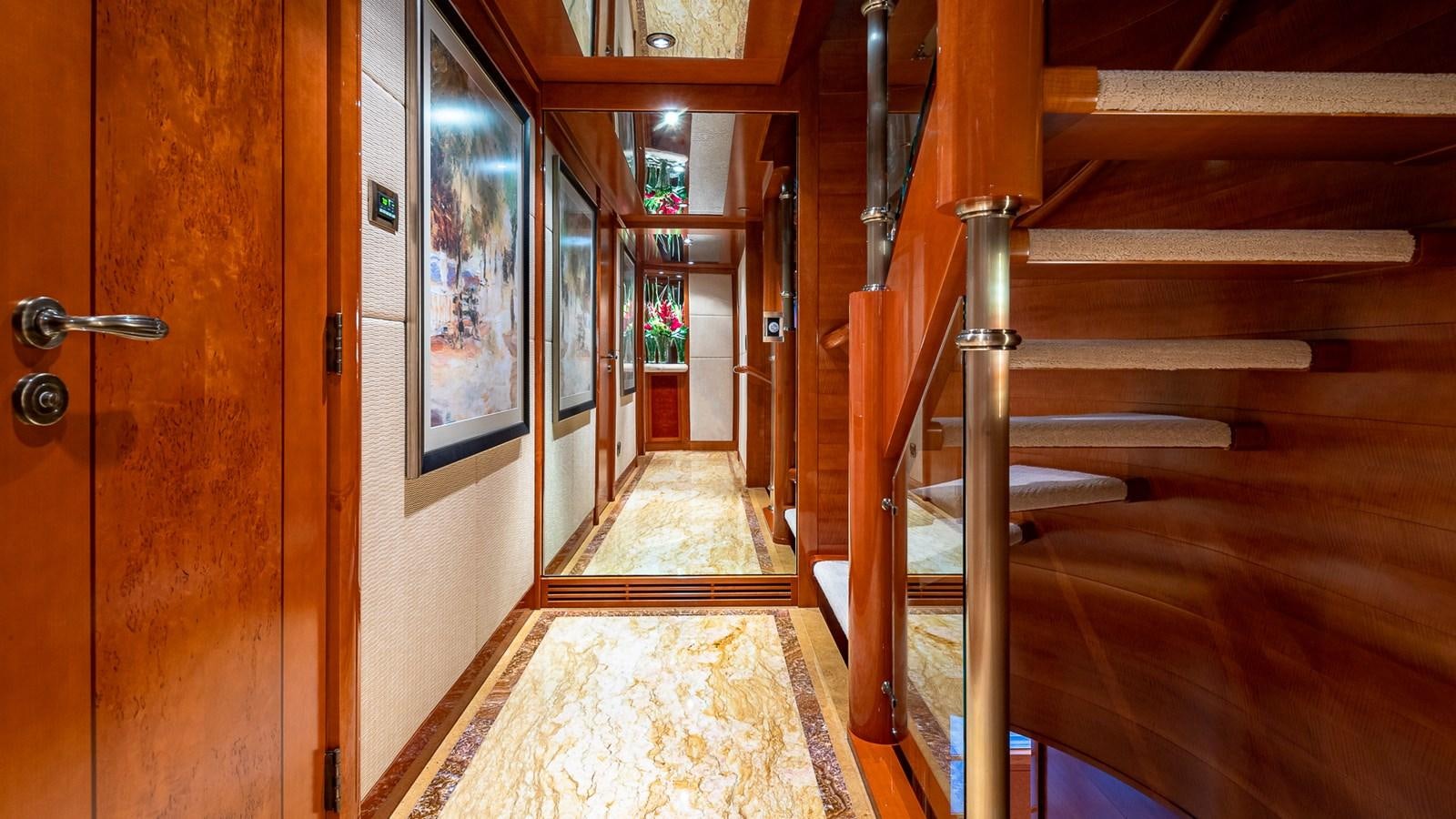 a hallway with wooden doors aboard AS YOU WISH Yacht for Charter