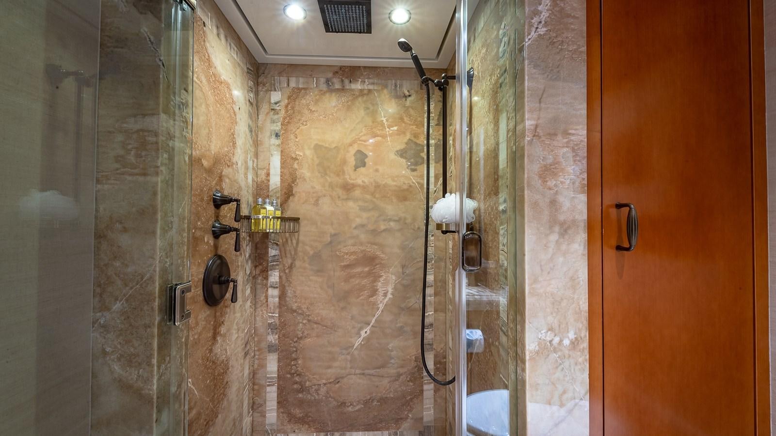 a bathroom with a shower aboard AS YOU WISH Yacht for Charter