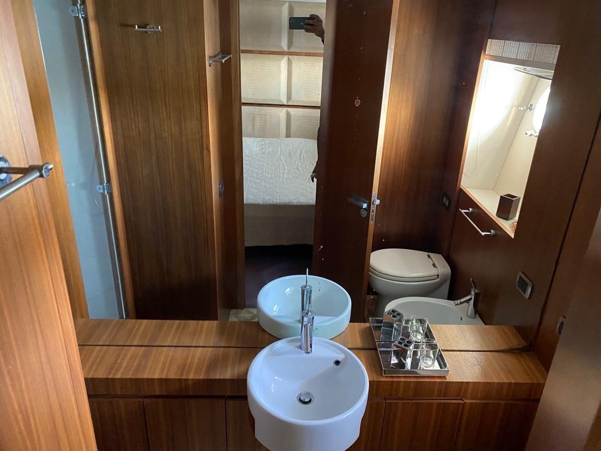 a bathroom with a sink and toilet aboard GINEVRA Yacht for Sale