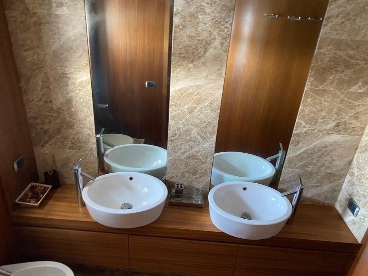 a bathroom with two sinks aboard GINEVRA Yacht for Sale
