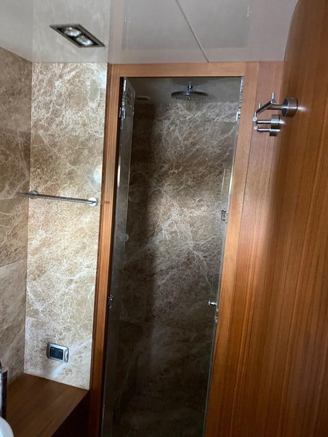 a wooden door with a glass door aboard GINEVRA Yacht for Sale