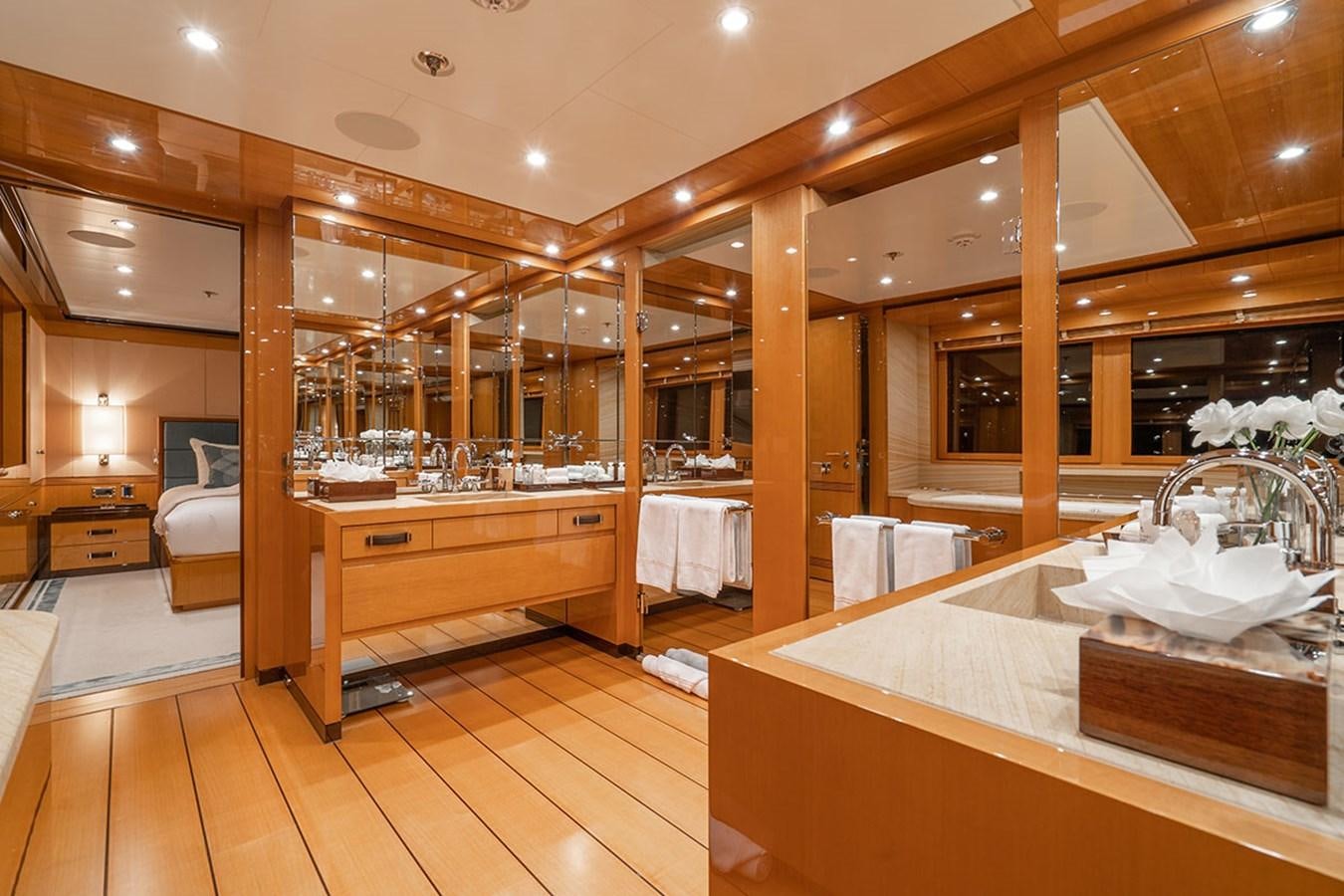 a bathroom with a large mirror aboard DEEP BLUE Yacht for Sale