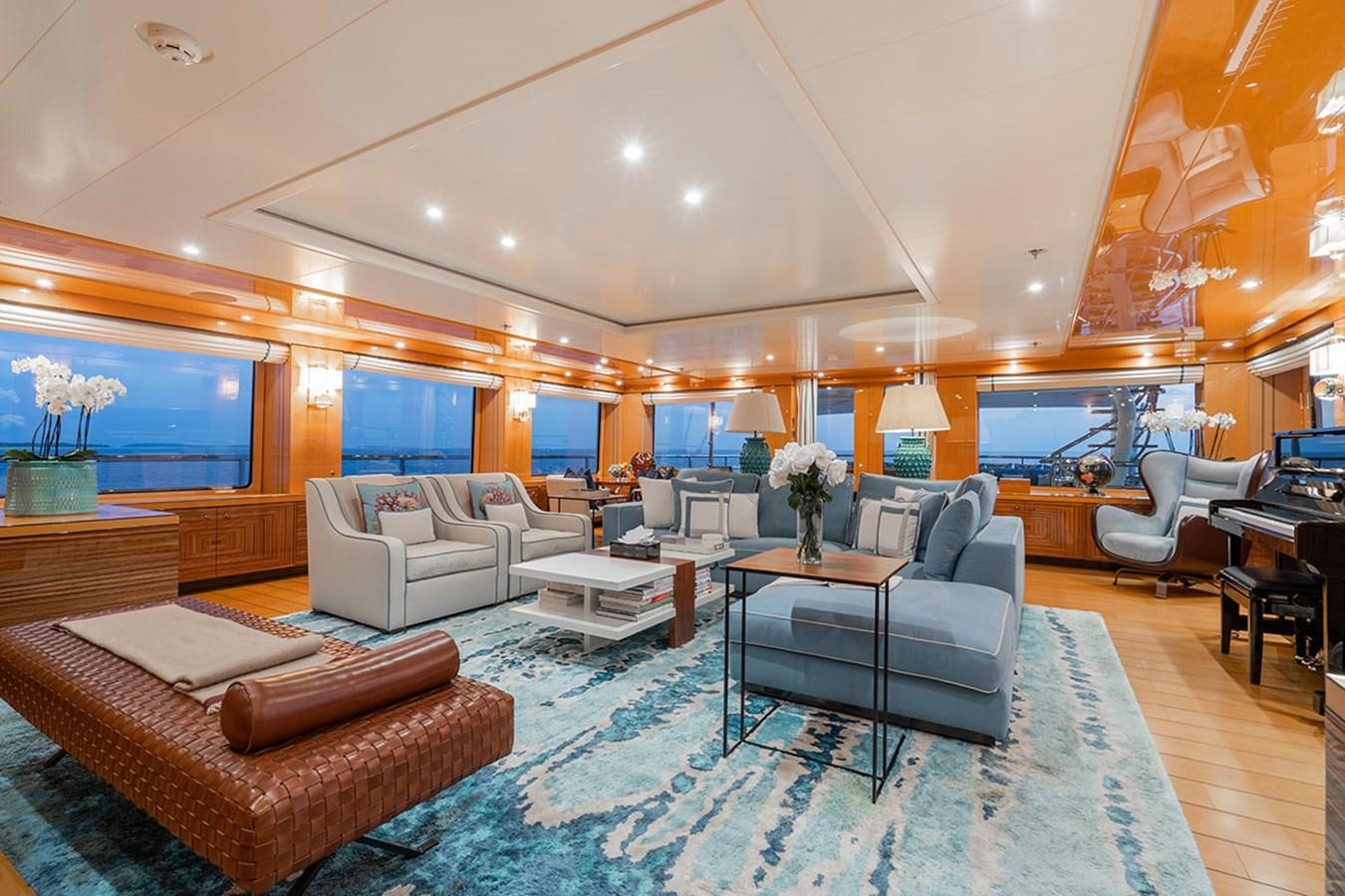 a large living room with a large window aboard DEEP BLUE Yacht for Sale