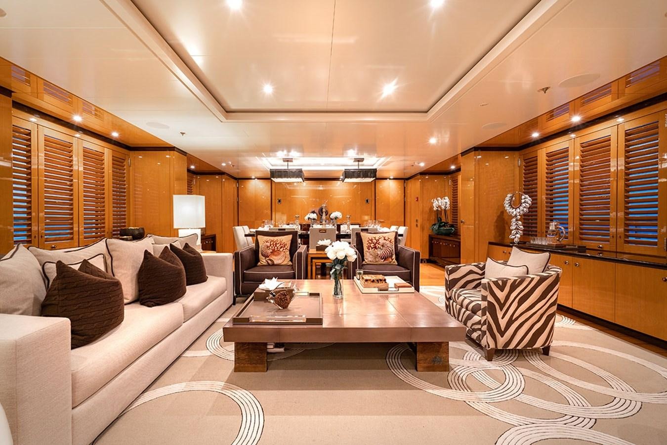 a living room with a large mirror aboard DEEP BLUE Yacht for Sale