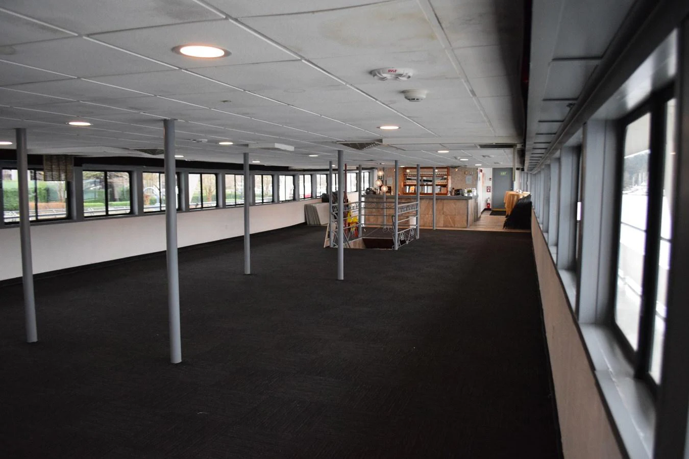 a hallway with a few doors aboard MAGIC SPIRIT Yacht for Sale