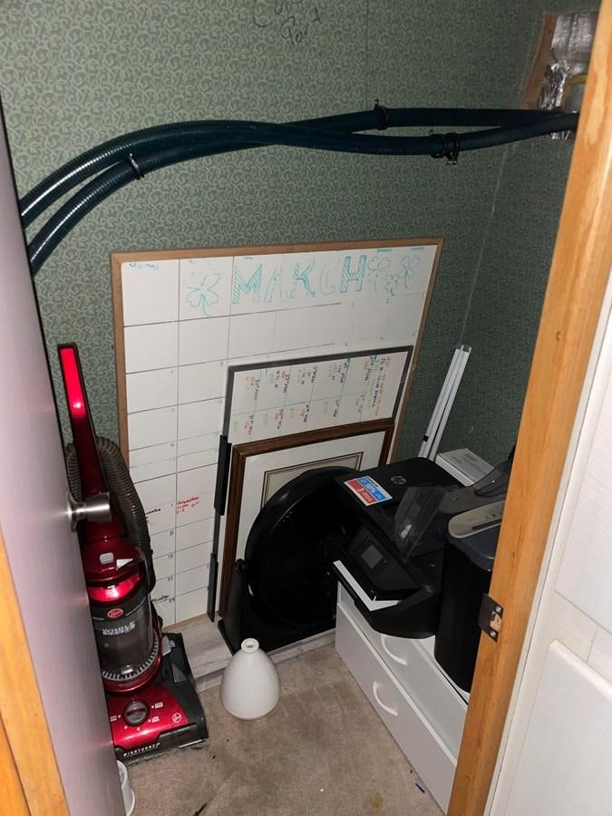 a room with a fireplace and a fan aboard MAGIC MOMENT Yacht for Sale