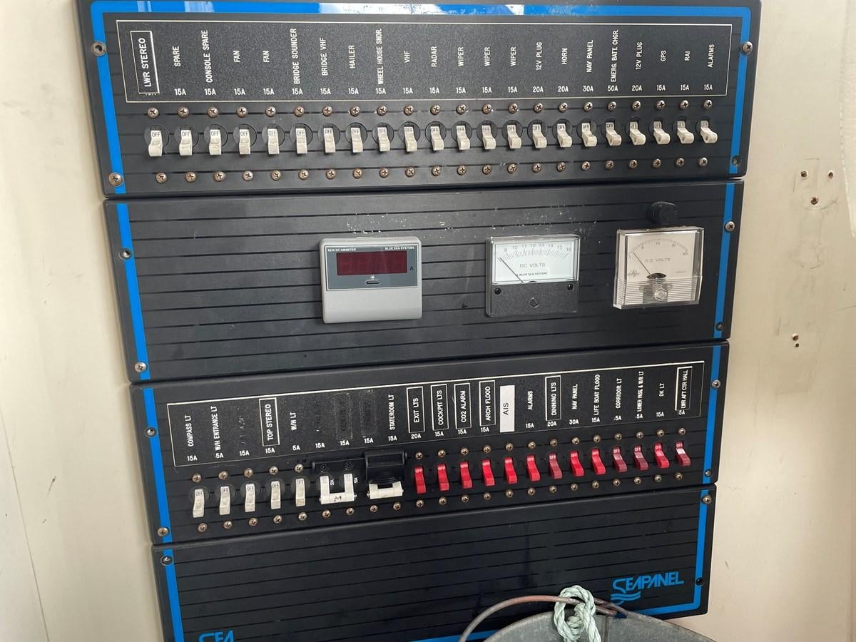 a black and white computer tower aboard MAGIC MOMENT Yacht for Sale