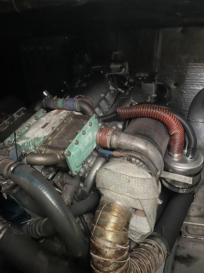 a car with a large engine aboard MAGIC MOMENT Yacht for Sale